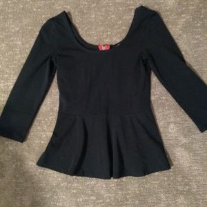 Black Express top made of a cotton blend.